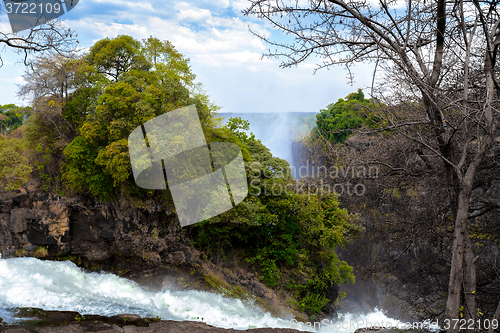 Image of The Victoria falls with mist from water