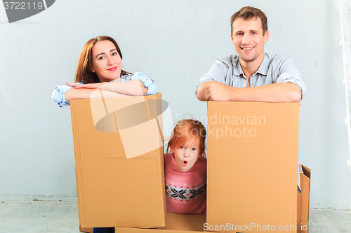 Image of The happy family  during repair and relocation