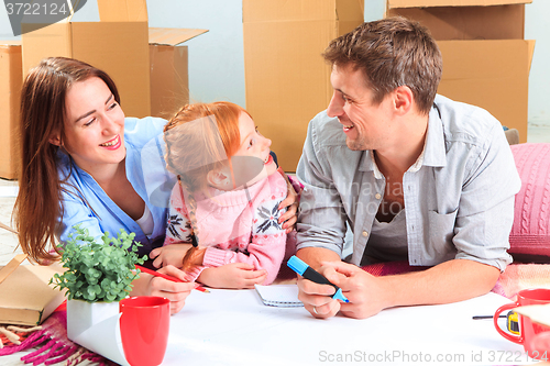 Image of The happy family  during repair and relocation