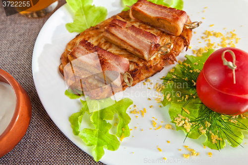 Image of veal meat with bacon