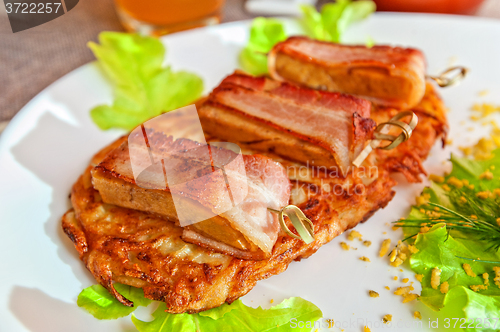 Image of veal meat with bacon