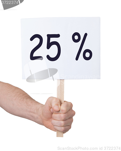 Image of Sale - Hand holding sigh that says 25%