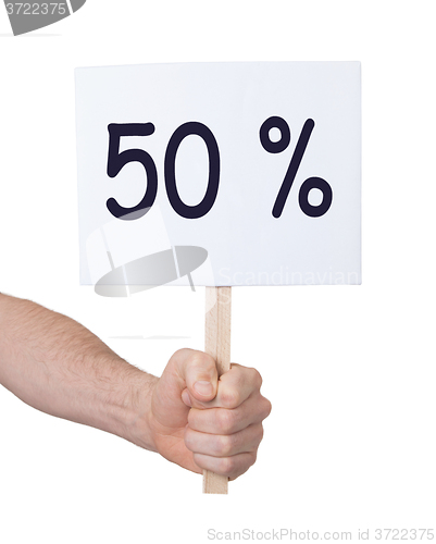 Image of Sale - Hand holding sigh that says 50%