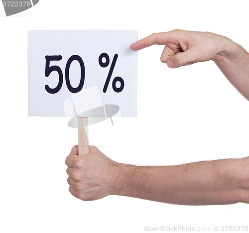 Image of Sale - Hand holding sigh that says 50%