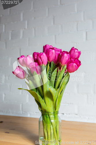 Image of beautiful pink tulips in a vase