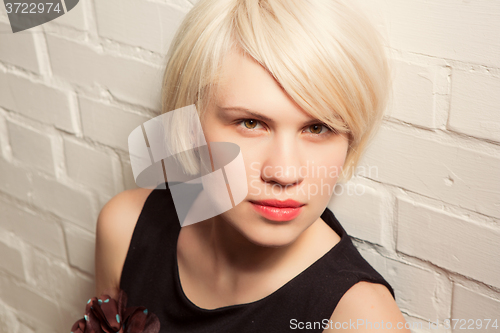 Image of Portrait of  beautiful woman with short hair