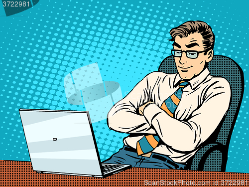 Image of Good businessman at laptop