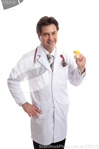 Image of Doctor or pharmacist with prescription medicine.