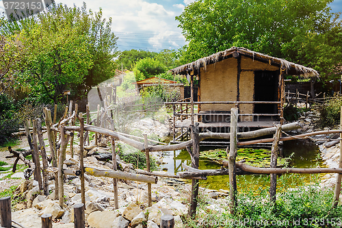 Image of Hut with Pond