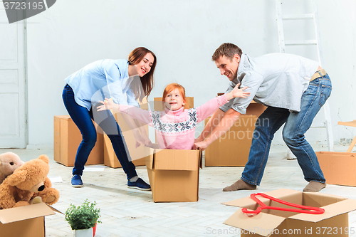 Image of The happy family  during repair and relocation