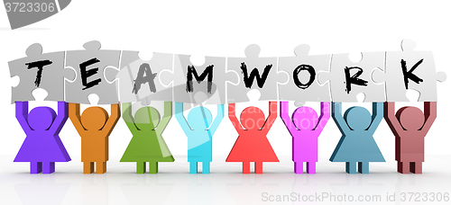 Image of Puppet hold puzzle with teamwork word