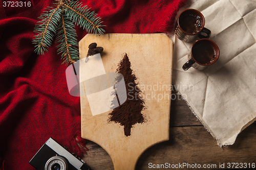 Image of The two cups of coffee on wooden background
