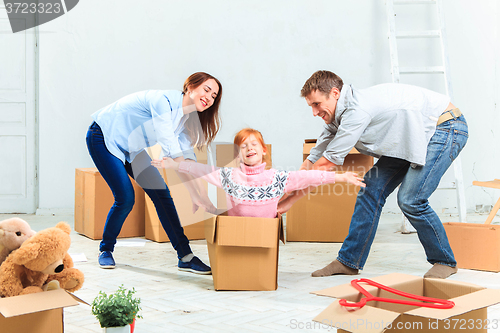 Image of The happy family  during repair and relocation