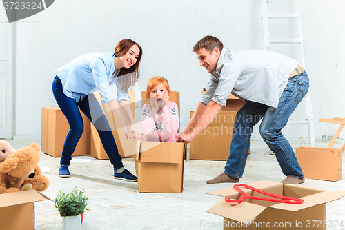 Image of The happy family  during repair and relocation