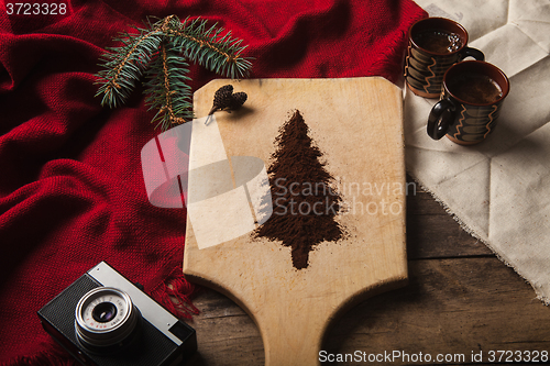 Image of The two cups of coffee on wooden background