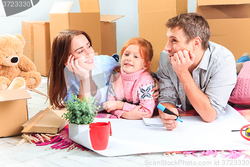 Image of The happy family  during repair and relocation