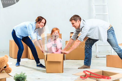 Image of The happy family  during repair and relocation