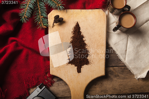 Image of The two cups of coffee on wooden background