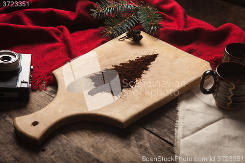 Image of The two cups of coffee on wooden background