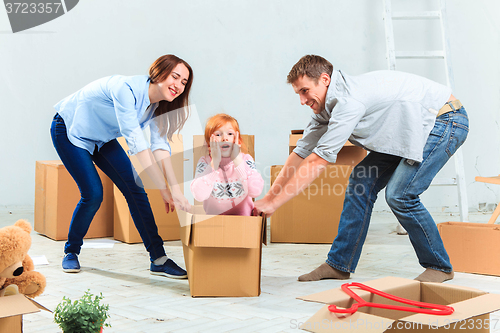 Image of The happy family  during repair and relocation