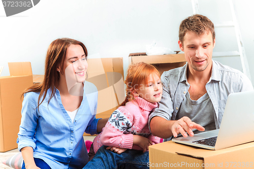 Image of The happy family  during repair and relocation