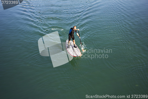 Image of Stand up paddle boarder