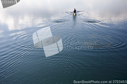 Image of Young man rowing