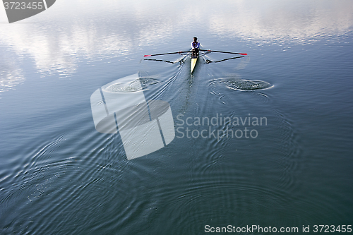 Image of Young man rowing