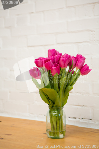 Image of beautiful pink tulips in a vase