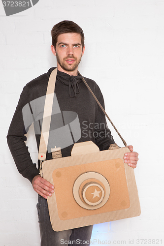 Image of man with cardboard camera