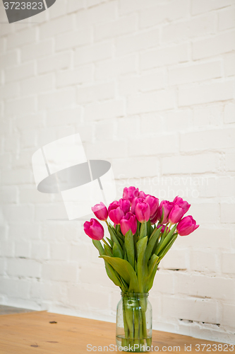 Image of beautiful pink tulips in a vase