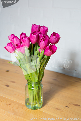 Image of beautiful pink tulips in a vase