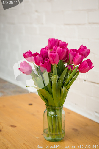 Image of beautiful pink tulips in a vase