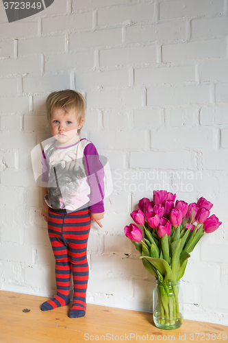 Image of child with tulips