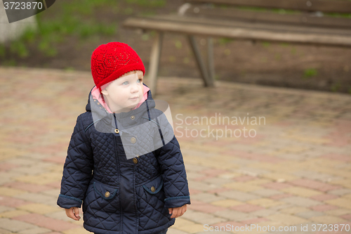 Image of beautiful little girl in the park