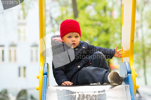Image of beautiful little girl in the park