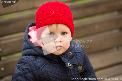 Image of beautiful little girl in the park