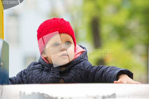 Image of beautiful little girl in the park