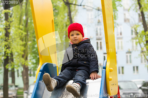 Image of beautiful little girl in the park