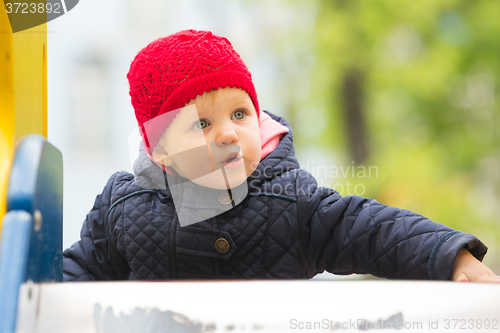 Image of beautiful little girl in the park