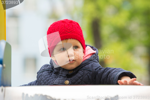 Image of beautiful little girl in the park