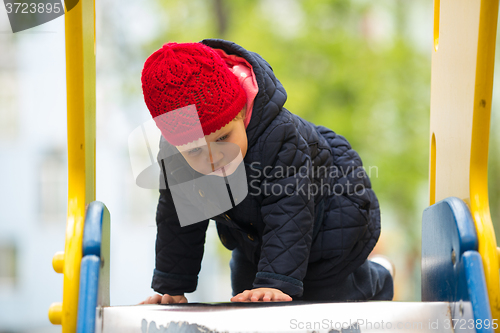 Image of beautiful little girl in the park