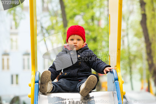 Image of beautiful little girl in the park