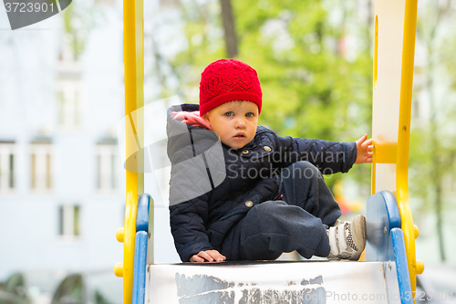 Image of beautiful little girl in the park