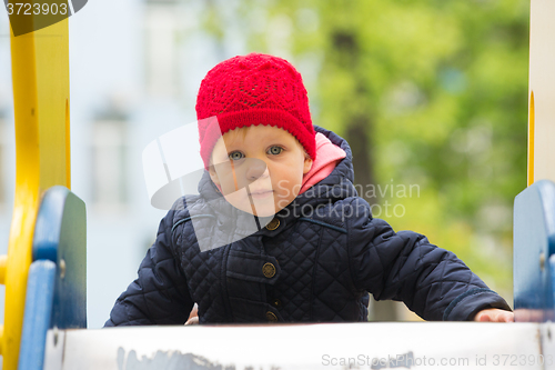 Image of beautiful little girl in the park