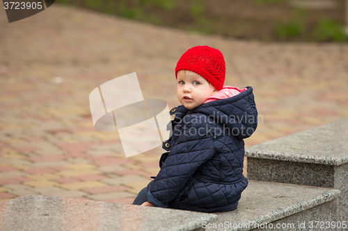 Image of beautiful little girl in the park