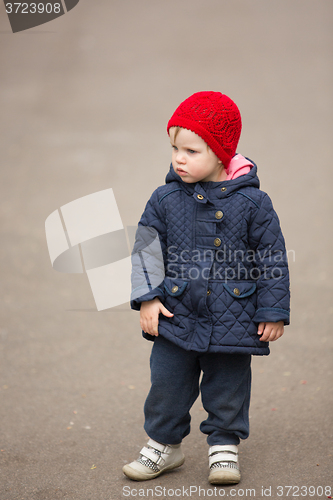 Image of little girl on a park alley