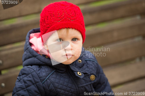 Image of beautiful little girl in the park