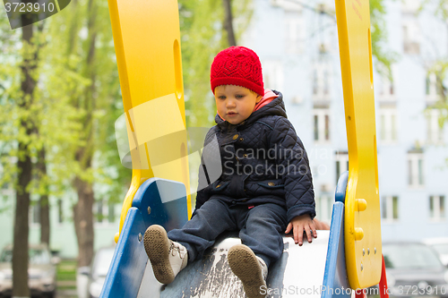 Image of beautiful little girl in the park