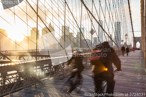 Image of Brooklyn bridge at sunset, New York City.